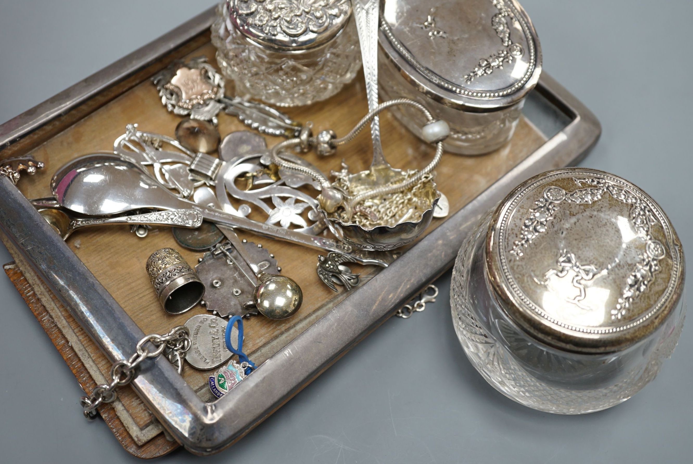 Assorted small silver and white metal jewellery including silver mounted photograph frame, four toilet jars, sifter spoon, brooches, medallion etc.
